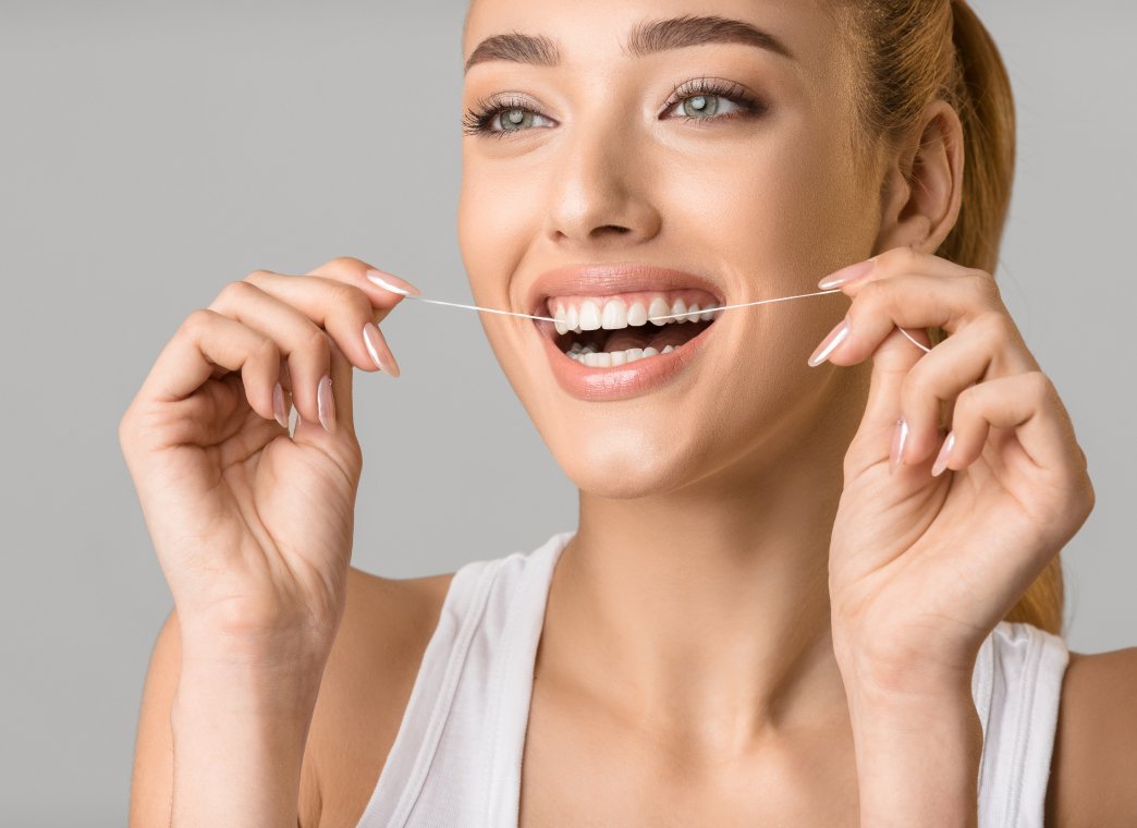 Jak správně používat dentální nit: Krok za krokem